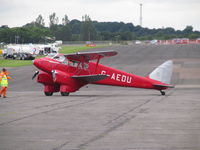 G-AEDU @ EGSX - taxying in at fly-in - by magnaman