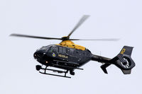 G-NWOI @ EGFF - EC-135P-2+, NPAS St Athan basedcall,  sign Police 32,previously D-HCBE, seen in the overhead.