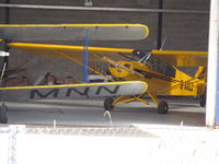 G-AXLZ @ EGKA - in hangar with a few other oldies - by magnaman