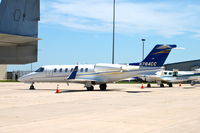 N784CC @ KCID - On the Signature Ramp - by Glenn E. Chatfield