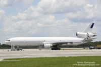 N412SN @ KRSW - McDonnell Douglas MD-11 (N412SN) sits on the ramp at Southwest Florida International Airport