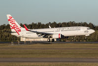 VH-VUL @ YBBN - VUL touching down between the PAPI - by V8Bathurst888