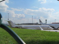 OE-ISA @ EGGW - across apron at luton - by magnaman