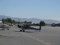 N103VW @ SZP - 1957 Piper PA-18-150 SUPER CUB, Lycoming O-320 uncowled, modified for Banner Towing, also longer wingspan?, Standard class registration, STOL landing, taxi off the active - by Doug Robertson