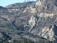 N49643 @ SZP - 1975 Bell 206B JETRANGER, one Allison 250-C20 turboshaft 420 shp for takeoff, 370 shp continuous, Restricted class with spray booms, ag applicator returning to OXR base via Santa Clara River route past SZP. - by Doug Robertson