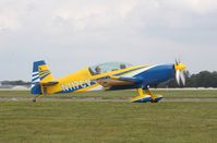 N117CV @ KOSH - Extra EA-300L