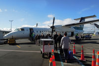 ZK-NEG @ NZAA - Boarding for the 25 minute hop to Tauranga - by Micha Lueck