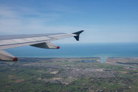 ZK-OJE @ NZCH - Onboard ANZ805 as we climb out of christchurch, looking east towards the south Pacific, About to start the turn West
