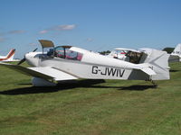 G-JWIV @ EGHA - on grass parking - by magnaman