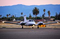 N223X @ KRHV - Locally-based Piper PA-34-200T taxing in at sunset after landing at Reid Hillview Airport, San Jose, CA. - by Chris Leipelt