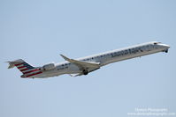 N570NN @ KSRQ - American Flight 5139 operated by PSA (N570NN) departs Sarasota-Bradenton International Airport enroute to Charlotte-Douglas International Airport