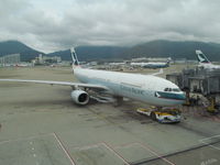 B-LAM @ VHHH - on stand at HKG - by magnaman