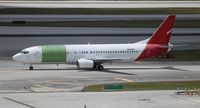 N230AG @ MIA - Ex Qantas 737-400 - by Florida Metal