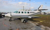 N303EI @ TIX - Cessna T303 - by Florida Metal