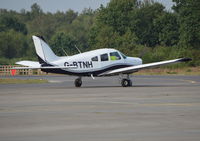 G-BTNH @ EGLK - Piper Cherokee Warrior II at Blackbushe. - by moxy