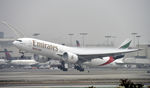 A6-EFK @ KLAX - Departing LAX - by Todd Royer