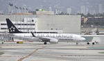 HP-1823CMP @ KLAX - Getting towed at LAX - by Todd Royer