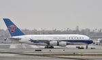 B-6140 @ KLAX - Taxiing to gate at LAX - by Todd Royer