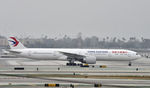 B-2023 @ KLAX - Taxiing to gate at LAX - by Todd Royer