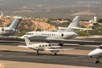 N150RJ @ MMSD - Parked in executive jet area. Blurry due to photo taken from another craft. - by Remi Farvacque
