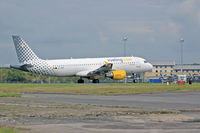 EC-MBK @ EGFF - A320-214, Vueling Airlines, call sign Vueling 12YQ, previously F-WWIP, JA02MC, OE-ICU, seen departing runway 12 en-route to Alicante. - by Derek Flewin