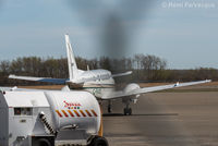 C-FAXE @ CYXJ - Parked to southeast of main terminal building.