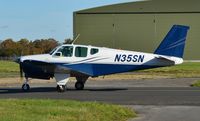 N35SN @ EGHH - Taxiing to Airtime on arrival - by John Coates