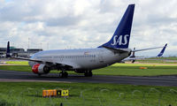 LN-TUK @ EGCC - Taxy to terminal at EGCC - by Clive Pattle