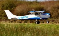 G-BRBH @ EGFH - Visiting Cessna 150H operated by Horizon Flight Training departing Runway 04. - by Roger Winser