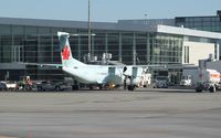 C-GGFJ @ CYQB - DHC-8-402 - by Mark Pasqualino