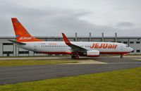 EI-EFW @ EGHH - Departing after repaint to Jeju Air livery - by John Coates