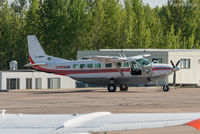 C-GMKW @ CYYE - Parked at extreme NE corner of airport. - by Remi Farvacque