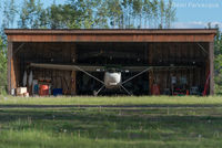 C-FFAD @ CYYD - In private hangar. Head-on shot.