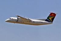 ZS-NMA @ FAJS - De Havilland Canada DHC-8-311 Dash 8 [358] (South African Express) Johannesburg Int~ZS 22/09/2006. Taken through the glass of the terminal. - by Ray Barber