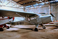 EI-BEU @ EIAB - Auster J/4 Archer [2069] Abbeyshrule~EI 15/04/1979. From a slide. Taken in a hangar that had seen better days. - by Ray Barber