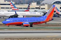 N738CB @ KLAX - One of over 700 Southwest B737's - by FerryPNL