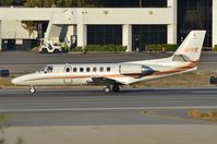 N191VE @ KVNY - Citation 560 rolling down the runway after landing. - by FerryPNL