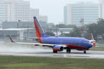 N447WN @ DAL - Departing Dallas Love Field in the rain.