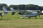 C-FKWX @ OSH - Cessna 336, c/n: 336-0112 - by Timothy Aanerud