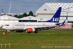 SE-RET @ EGCC - SAS Scandinavian Airlines - by Chris Hall
