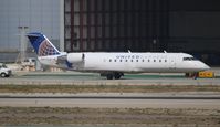 N971SW @ LAX - United Express - by Florida Metal