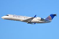 N913SW @ KLAX - United Express CL200 - by FerryPNL