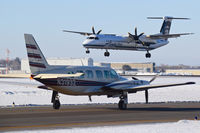 N31932 @ KBOI - Taxing on Alpha to RWY 10L while Horizon N446QX lands on 10L. - by Gerald Howard