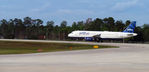 N607JB @ KMCO - Beantown blue Recently arrived at MCO from BWI - by laferrierem