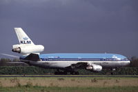 PH-DTB @ EHAM - KLM DC-10-30 taxiing at Schiphol airport, the Netherlands, 1990 - by Van Propeller