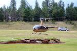 N86SL - N86SL R44 departing a roadside helipad near Custer SD - by Pete Hughes