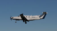 N874SA @ KSQL - Surf Air 2015 Pilatus PC-12/47E climbing out from San Carlos Airport, CA - by Steve Nation