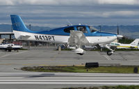 N413PT @ KSQL - Locally-based 2012 Cirrus SR20 GTS over the threshold @ San Carlos Airport, CA - by Steve Nation