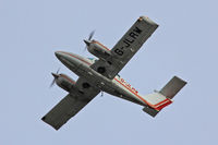 G-JLRW @ EGFF - Duchess, Exeter Devon based, previously N60206, seen in the overhead following an ILS approach.