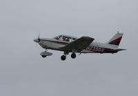 N2395V @ KSQL - Locally-based PA-28-181 Cherokee climbing out @ San Carlos Airport, CA - by Steve Nation
